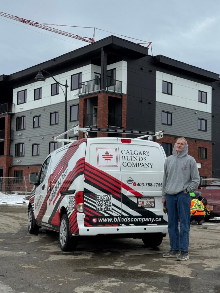 Calgary Blinds Company in Brookly featuring our van, building and Ivan our installer