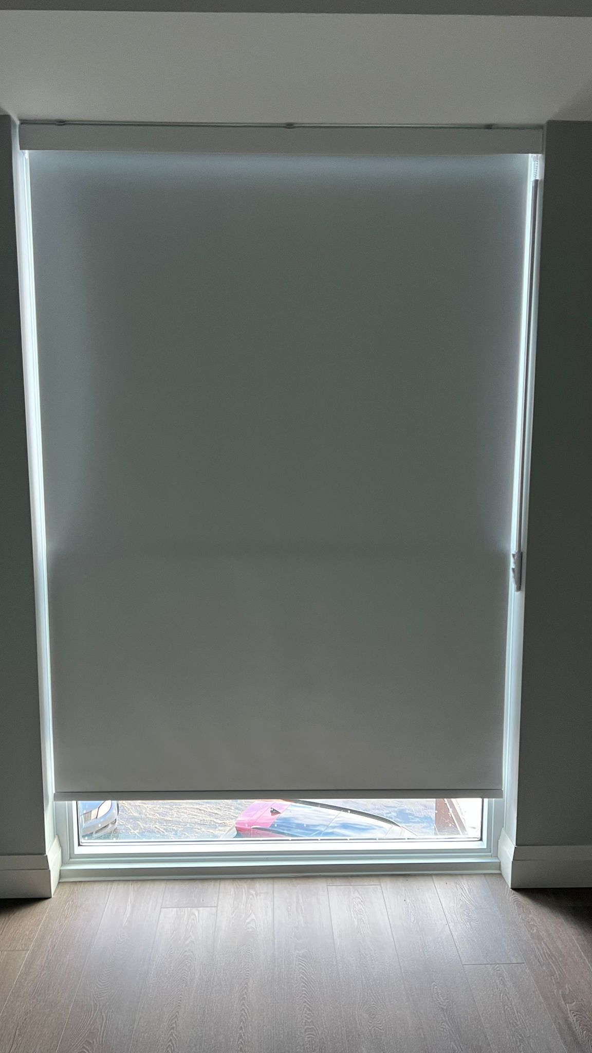 Blackout roller blinds with chain shroud at Wellings of Calgary